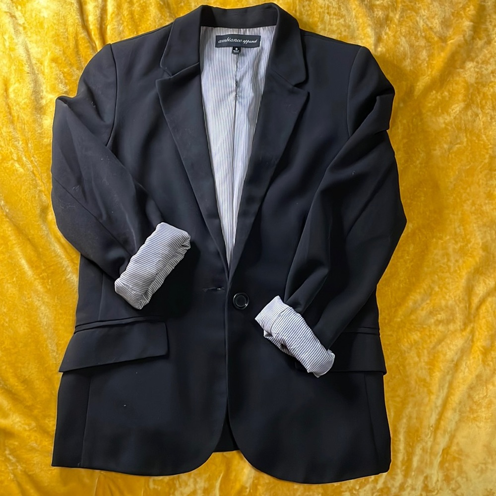 Black blazer with pinstripe detail inside sleeves